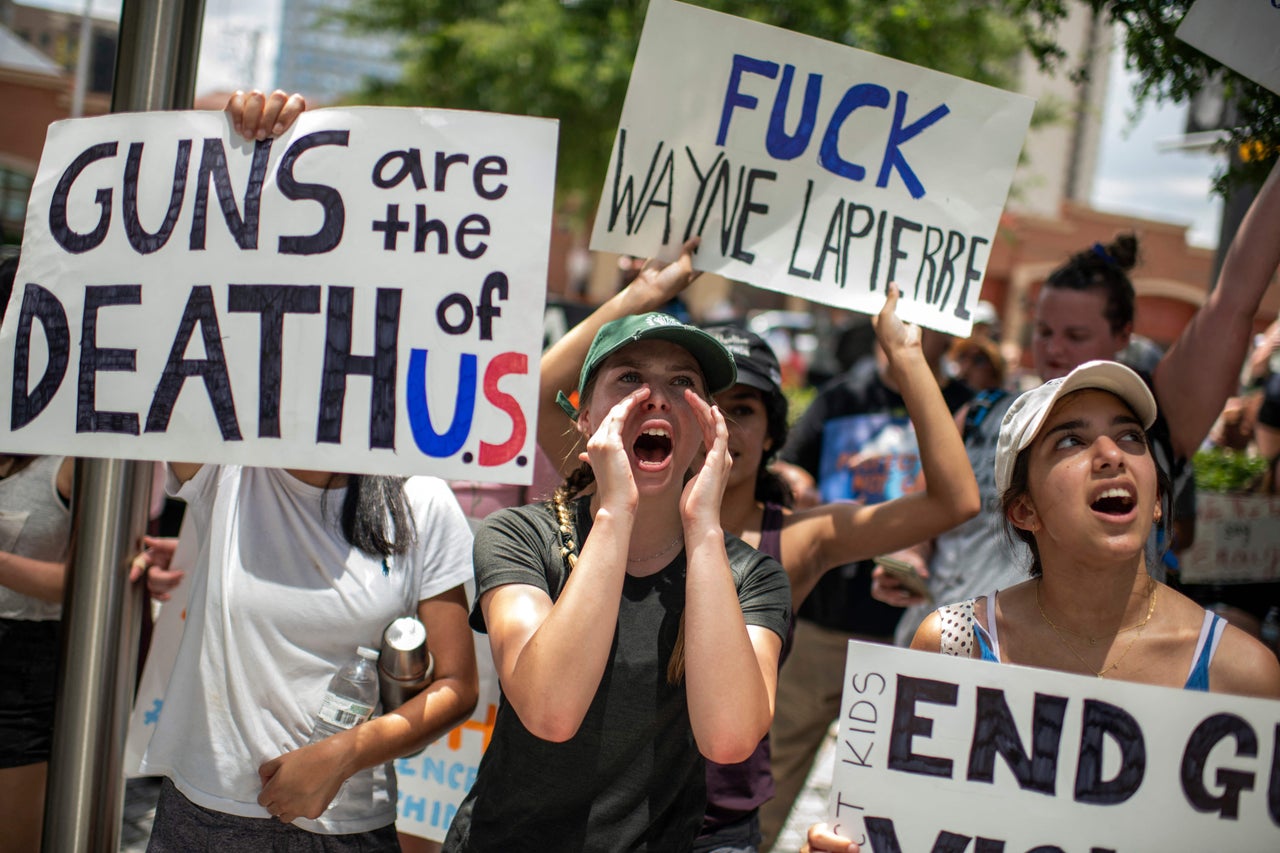 Demonstrators shout during the March for Our Lives rally in Houston.