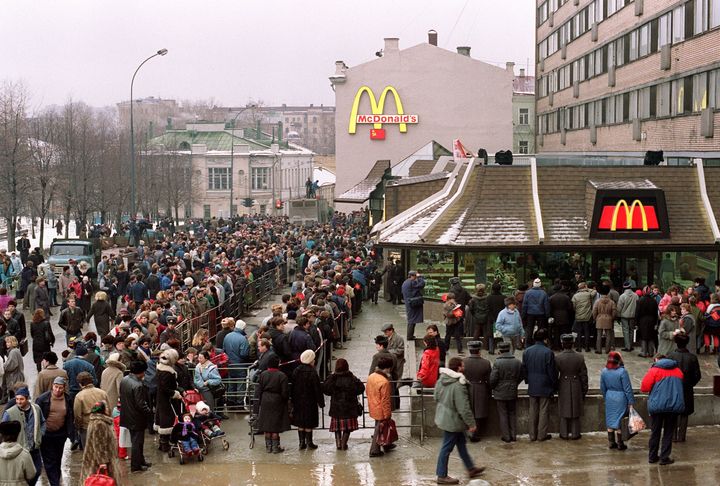 Customers stand in line outside the just opened first McDonald's in the Soviet Union on Jan. 31, 1990, at Moscow's Pushkin Square. 