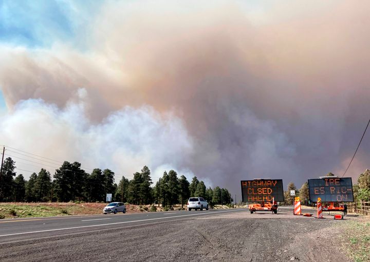 Smoke from a wildfire rises in the sky outside of Flagstaff, Arizona on Sunday.