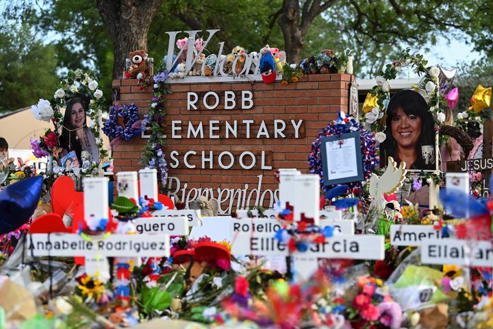 Flowers, messages, balloons, stuffed animals, toys and other items are seen left by mourners commemorating the students and teachers of the Robb Elementary School mass shooting in Uvalde, Texas.