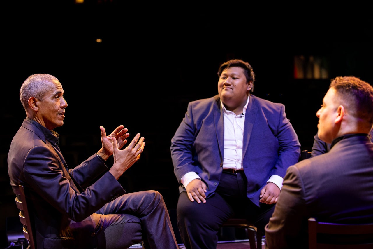 Obama Marks DACA’s tenth Anniversary In Dialog With Dreamers 24 Basnet and Valdovinos listening as Obama speaks.