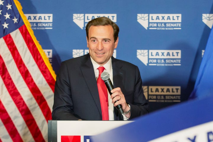 Nevada Republican Senate candidate Adam Laxalt celebrates his victory with family, friends and supporters at the Tamaraki Casino in Reno, Nevada on Tuesday, June 14, 2022.
