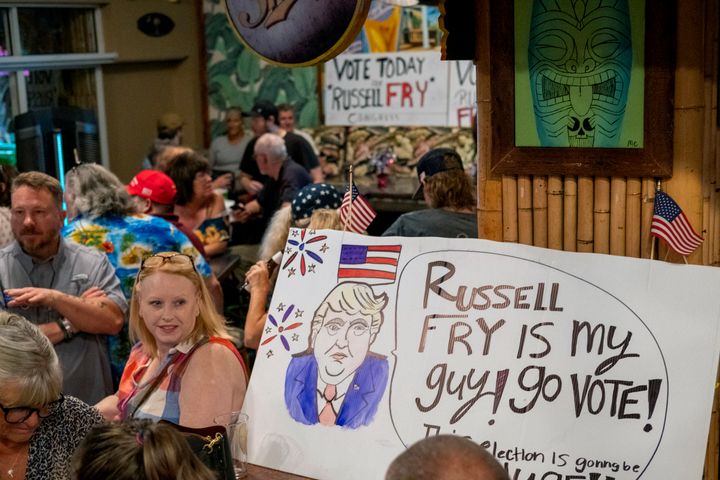 Supporters celebrate South Carolina Rep. Russell Fry's win over U.S. Rep. Tom Rice for his congressional seat in the Republican primary, at the 8th Avenue Tiki Bar in Myrtle Beach, S.C., June 14, 2022. 