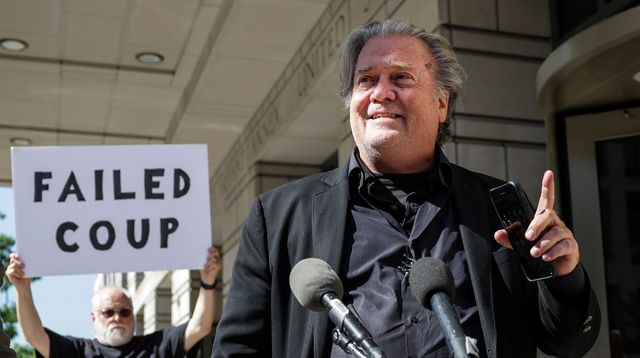 1 Strategically Placed Protest Sign Ruins Steve Bannon's Attempt To Control Narrative.jpg