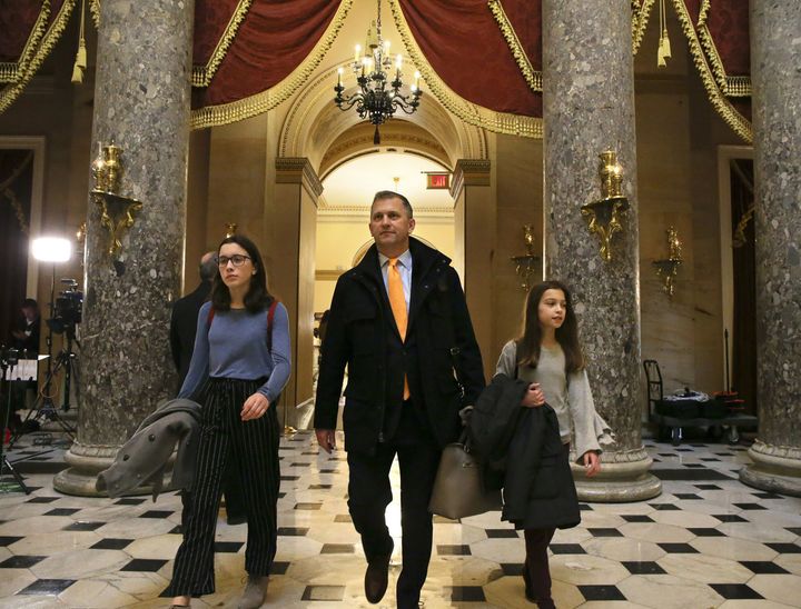 Congressman Sean Casten with his daughters Gwen, left, and Audrey, walk through the U.S. Capitol Building on Jan. 4, 2019.