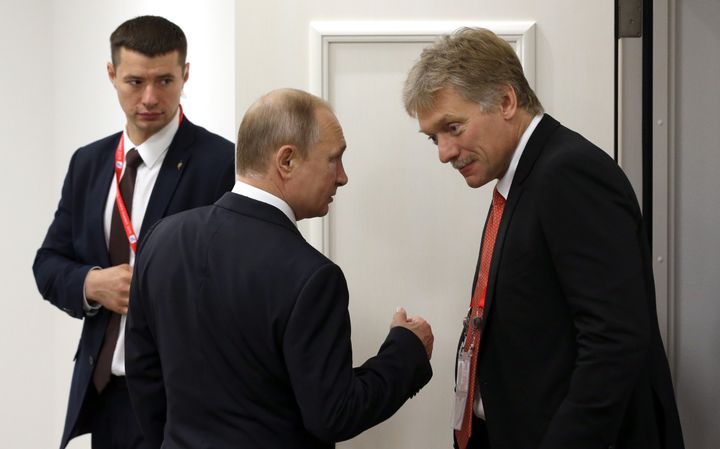 Vladimir Putin y Dmitri Peskov.