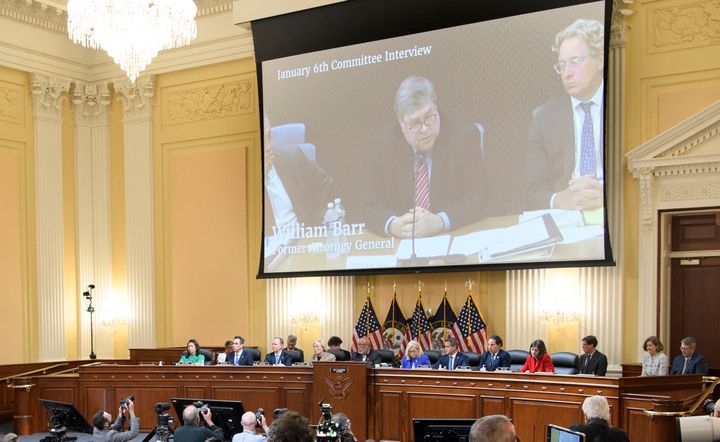 An image of former Attorney General William Barr is displayed on a screen as the House select committee investigating the Jan. 6 attack on the U.S. Capitol holds its first public hearing to reveal the findings of a year-long investigation, on Capitol Hill in Washington, on June 9, 2022.