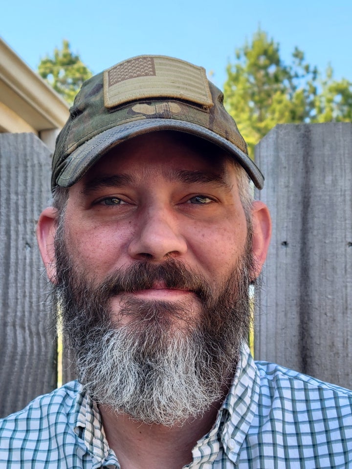 U.S. citizen Alexander Drueke poses for a picture before leaving for Ukraine, in Tuscaloosa, Alabama, U.S., March 28, 2022. 