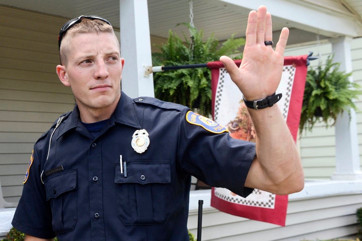 Christopher Schurr is seen in uniform with the Grand Rapids Police Department back in 2015. He was fired from the police force Friday after being charged with second-degree murder in the death of Patrick Lyoya.