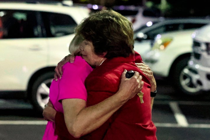 Church members console each other after a shooting at the Saint Stevens Episcopal Church on June 16, 2022 in Vestavia, Ala.