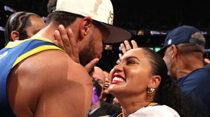 Ayesha Curry celebrates the Warriors' championship with Steph Curry.