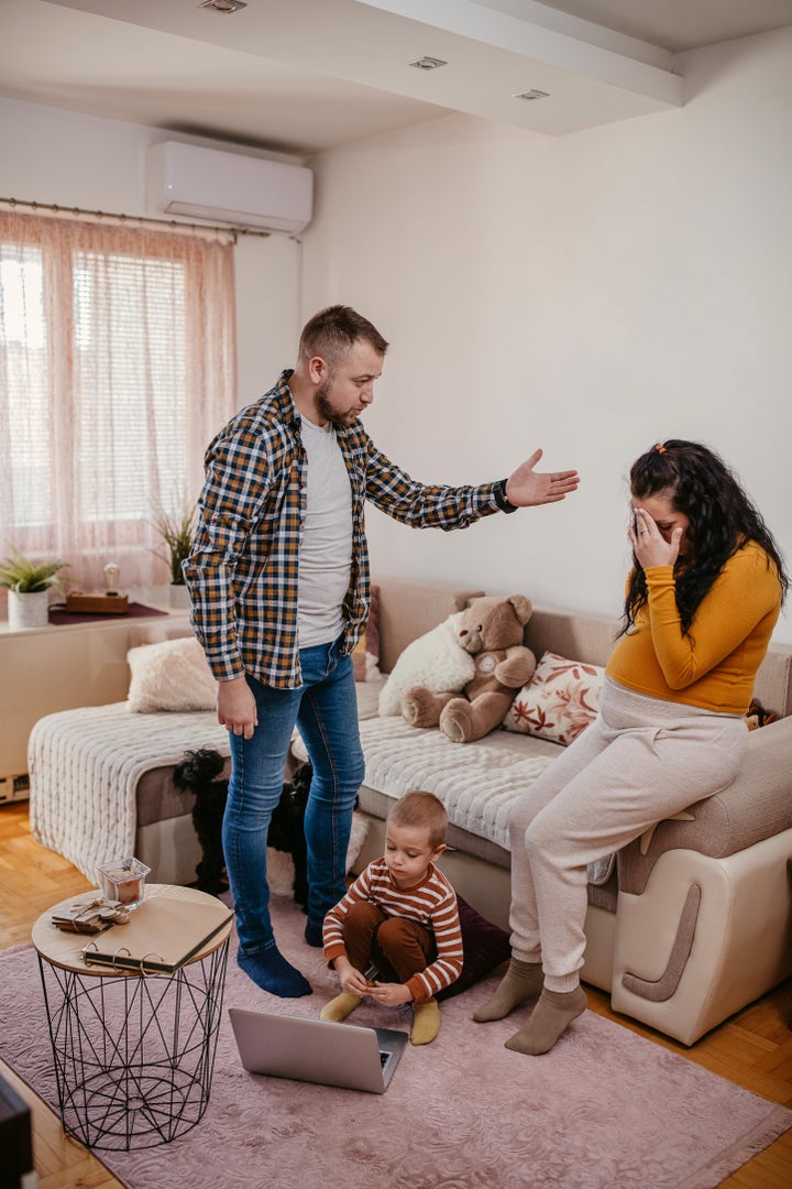 Man shouts at his pregnant wife in front of their son