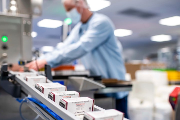 This May 2022 photo provided by Pfizer shows production of the Pfizer's COVID-19 vaccine for children under 5 in Puurs, Belgium. (Pfizer via AP)