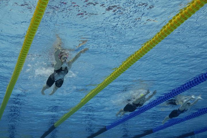 Swimmers compete in the women's 200m medley finals during the Budapest 2022 World Aquatics Championships at Duna Arena in Budapest on Sunday.