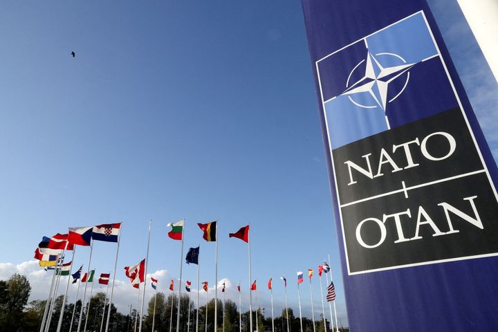  Flags wave outside the Alliance headquarters ahead of a NATO Defence Ministers meeting, in Brussels, Belgium, October 21, 2021. REUTERS/Pascal Rossignol