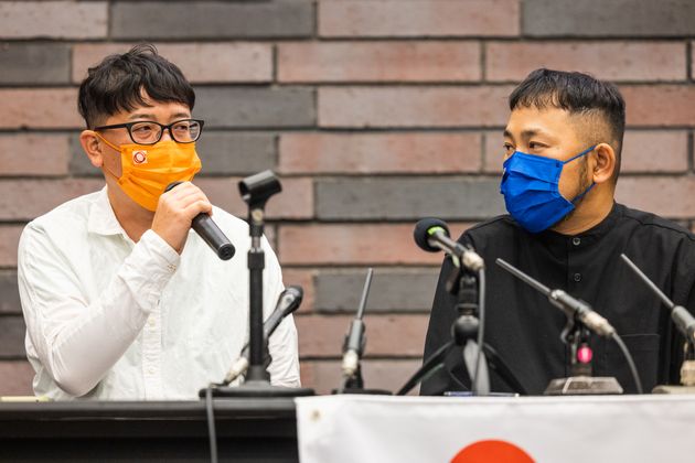 大阪地裁原告の田中昭全さん（右）と川田有希さん