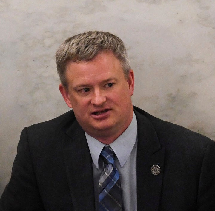 Attorney General Jason Ravnsborg, center, appears for the first day of his impeachment trial on Tuesday, June 21, 2022, at the South Dakota State Capitol in Pierre, S.D. (Erin Woodiel/The Argus Leader via AP)