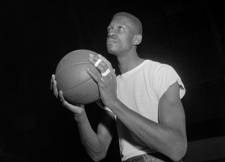 Bill Russell, seen in 1956 while playing at the University of San Francisco, was known for his defensive work on the court and his civil rights advocacy.