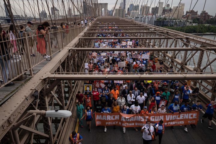 Demonstrators march across the Brooklyn Bridge during the "March for Our Lives" rally against gun violence in Brooklyn, New York, on June 11.