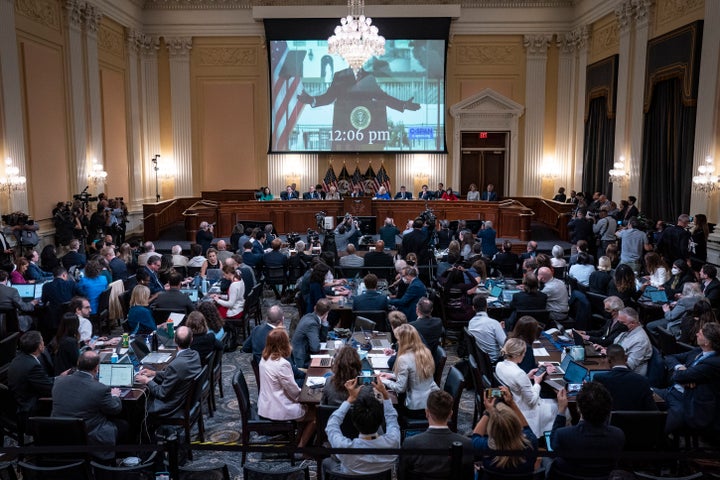A video of former President Donald Trump speaking during a rally near the White House on Jan. 6, 2021, is shown on a screen at a hearing held by the House select committee on June 9.