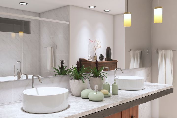 A curated bathroom counter is reminiscent of luxury hotels. 