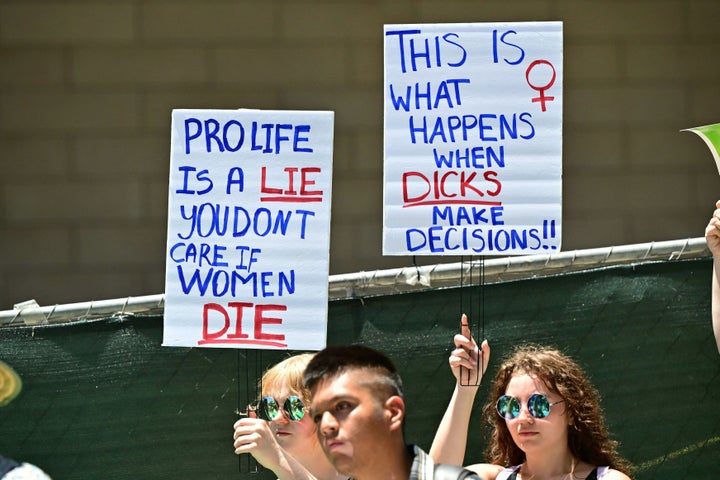 Activists protest in front of the federal courthouse in Los Angeles.