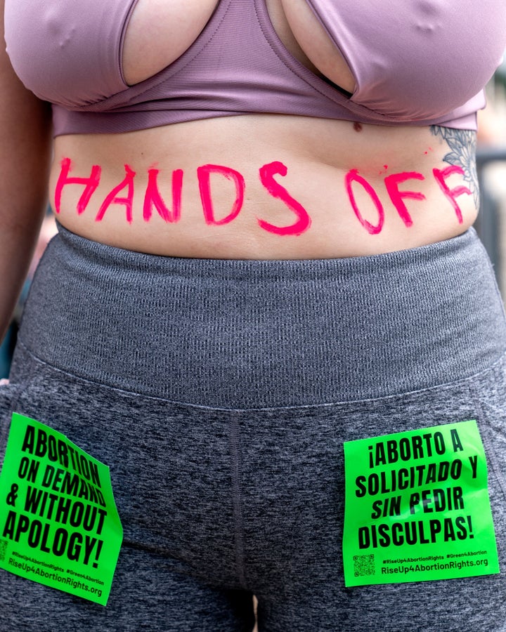 An abortion rights activists stands outside the U.S. Supreme Court after its decision to overturn Roe v. Wade.