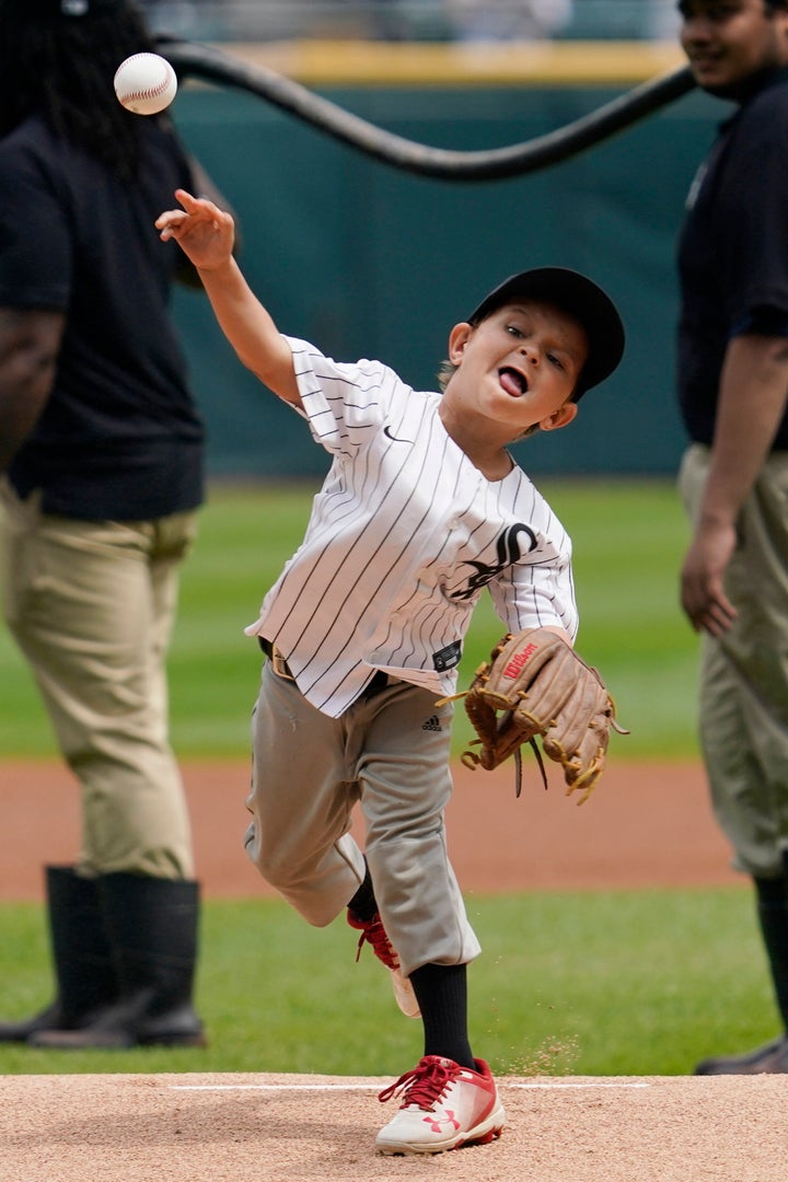 Beau Dowling throws out a ceremonial first pitch before a baseball game between the Baltimore Orioles and the Chicago White Sox on Saturday.