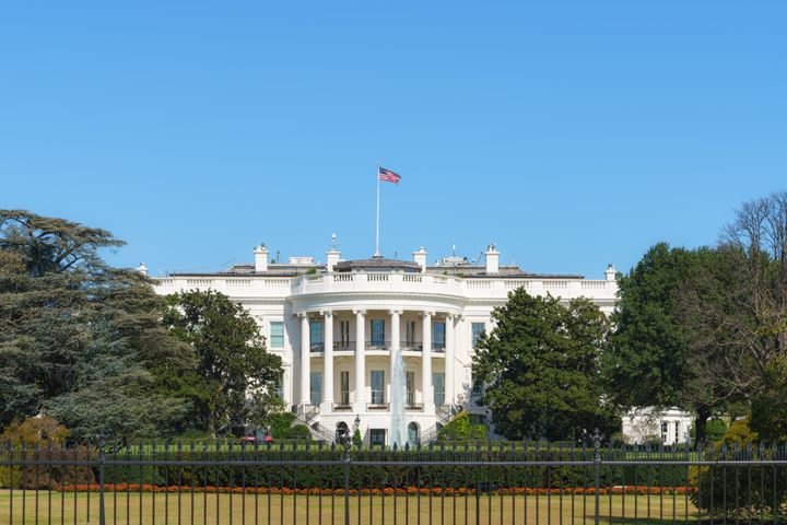 White House on deep blue sky background in Washington DC, USA."n