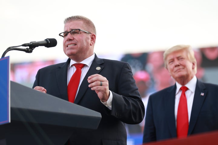 Illinois gubernatorial hopeful Darren Bailey, left, received an endorsement from former President Donald Trump during a Save America Rally. 