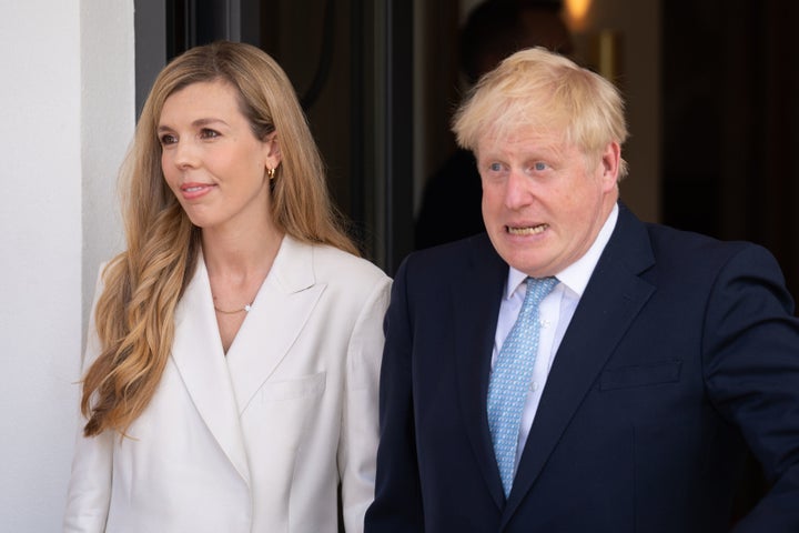 Boris Johnson and wife Carrie arrive for the official welcome ceremony on the first day of the three-day G7 summit at Schloss Elmau on June 26, 2022.