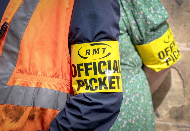 RMT members on the picket line outside Edinburgh's Waverley Station, as train services continue to be disrupted following the nationwide strike by members of the Rail, Maritime and Transport union along with London Underground workers in a bitter dispute over pay, jobs and conditions. Picture date: Saturday June 25, 2022.