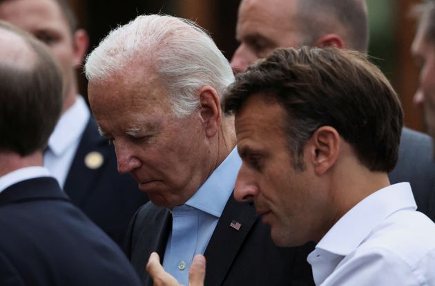 US President Joe Biden during an exchange with Emmanuel Macron ...