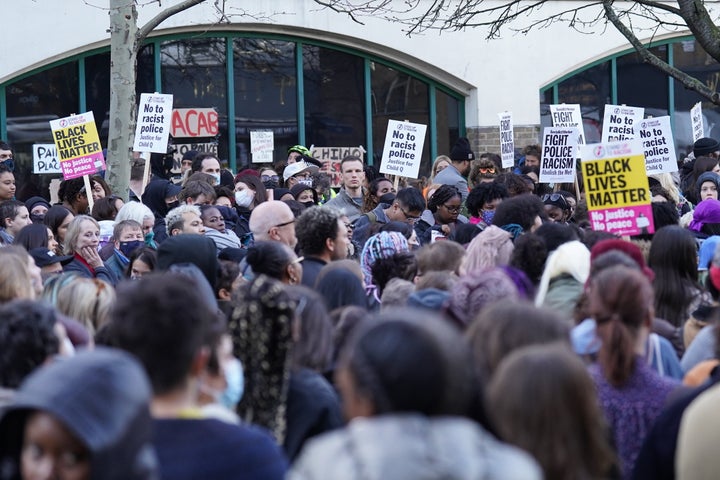 People demonstrate outside Stoke Newington Police Station in London, over the treatment of a Black 15-year-old schoolgirl who was strip-searched by police.