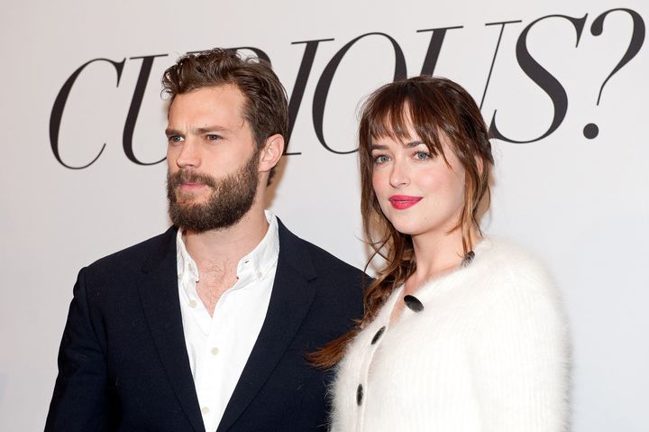 Jamie Dornan and Dakota Johnson attend a "Fifty Shades of Grey" screening in 2015. 