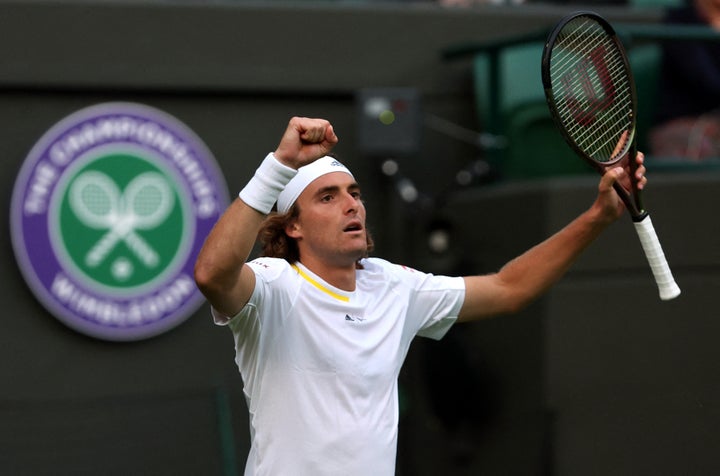 Tennis - Wimbledon - All England Lawn Tennis and Croquet Club, London, Britain - June 28, 2022 Greece's Stefanos Tsitsipas celebrates winning his first round match against Switzerland's Alexander Ritschard REUTERS/Paul Childs