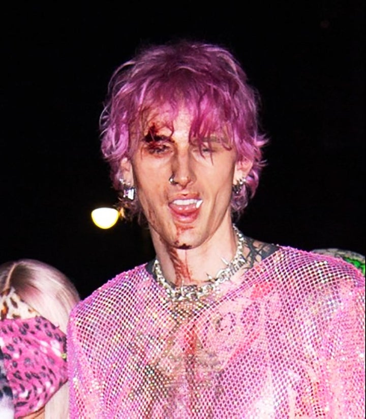 Machine Gun Kelly leaving the afterparty at Catch Steak in New York City on Tuesday night covered in blood.