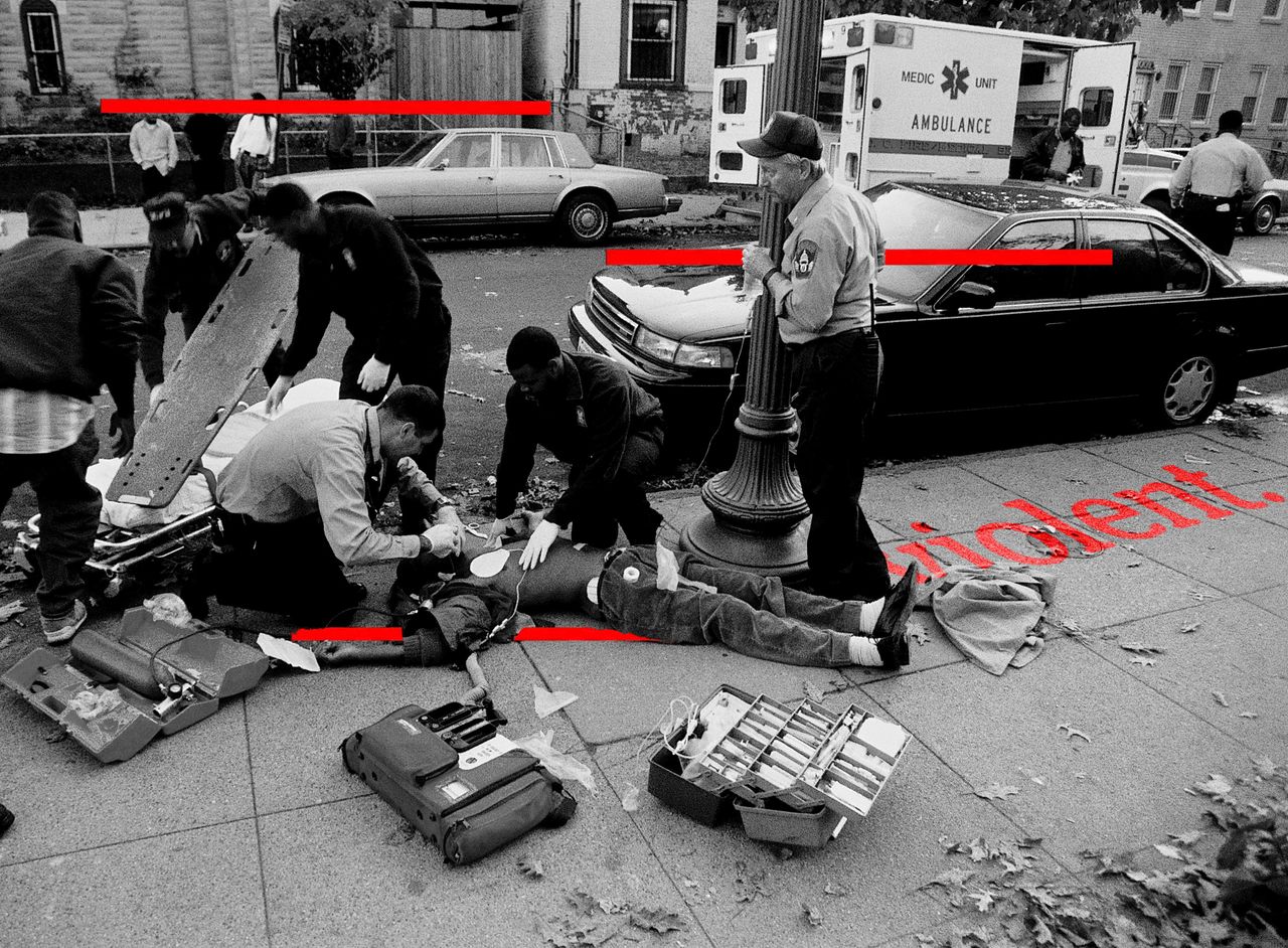 Washington, D.C., paramedics work on a shooting victim in 1993.