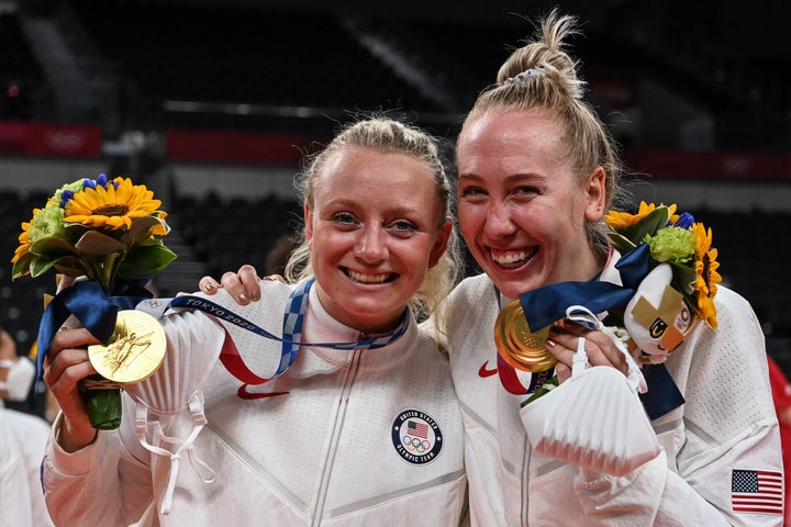 USA's Jordyn Poulter and Michelle Bartsch-Hackley pose with their gold medals during the women's volleyball victory ceremony during the Tokyo 2020 Olympic Games at Ariake Arena in Tokyo on August 8, 2021. (Photo by YURI CORTEZ / AFP) (Photo by YURI CORTEZ/AFP via Getty Images)