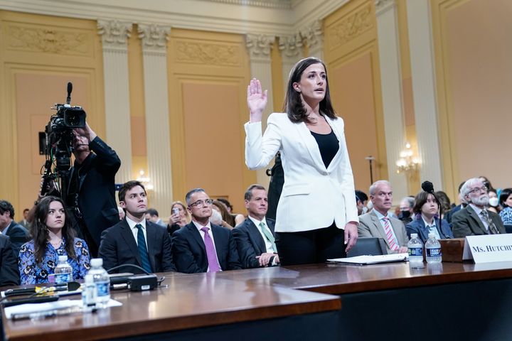 Cassidy Hutchinson, a top aide to Mark Meadows when he was White House chief of staff in the Trump administration, is sworn in as the House Jan. 6 select committee holds a public hearing on Capitol Hill on Tuesday.