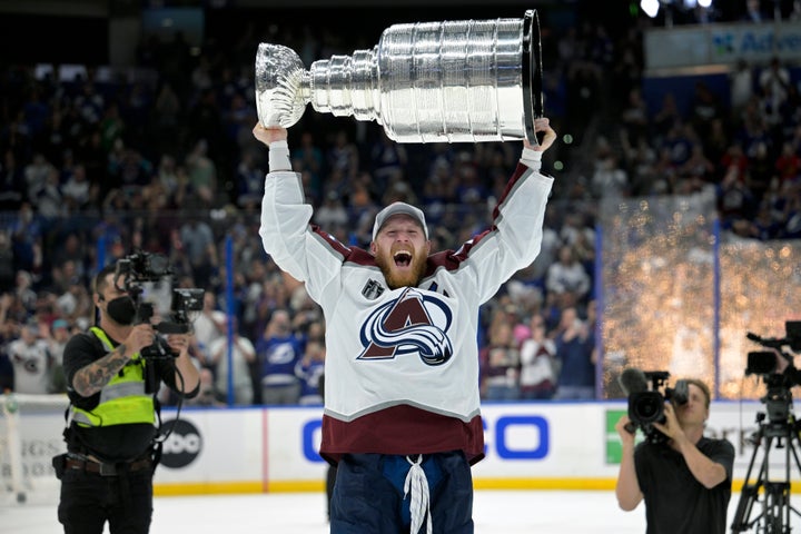 Colorado Avalanche left wing Gabriel Landeskog lifts the Stanley Cup after the team defeated the Tampa Bay Lightning in Game 6 of the NHL hockey Stanley Cup Finals on Sunday.