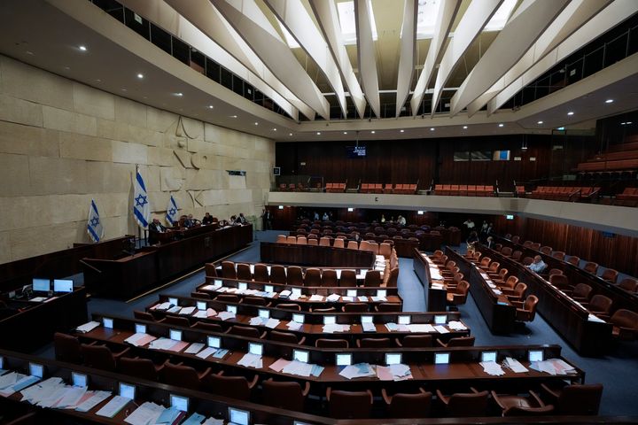 A view shows the plenum of the Knesset, Israel's parliament, in Jerusalem, Thursday, June 30, 2022. (AP Photo/Ariel Schalit)