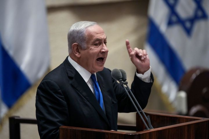 Israeli former Prime Minister Benjamin Netanyahu speaks at Knesset ahead of the vote on a bill to dissolve parliament, at the Knesset, Israel's parliament, in Jerusalem, Thursday, June 30, 2022. (AP Photo/Ariel Schalit)