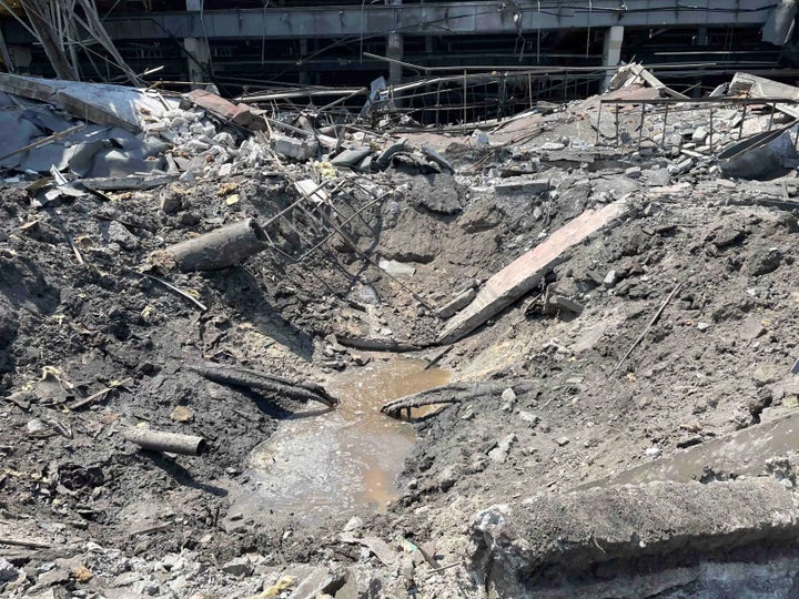 Impact crater at the Kremenchuk Road Vehicle Factory, a large industrial complex adjacent to the shopping center on June 29, 2022.