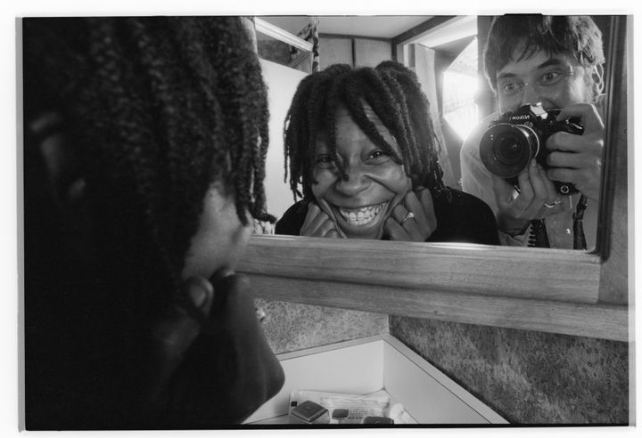 Whoopi Goldberg and photographer Roger Ressmeyer are reflected in the bathroom mirror of her home near San Francisco.