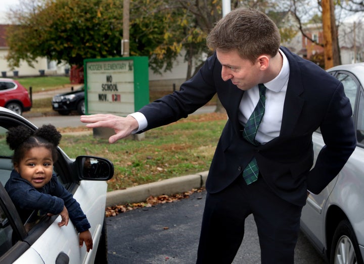 During his Senate run in 2016, Kander talked with Teh'Riyah Hinkel, 1, after thanking her aunt for coming out to vote during a last-minute campaign stop on Election Day.