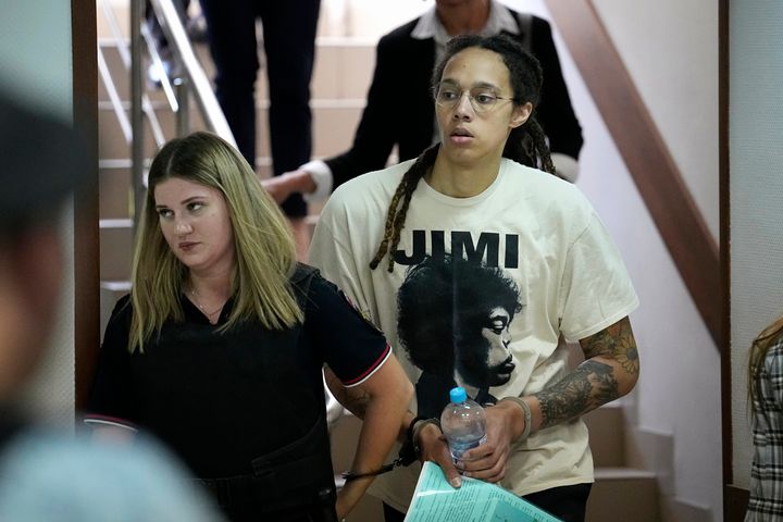 WNBA star and two-time Olympic gold medalist Brittney Griner is escorted to a courtroom for a hearing, in Khimki just outside Moscow, Russia on July 1, 2022.