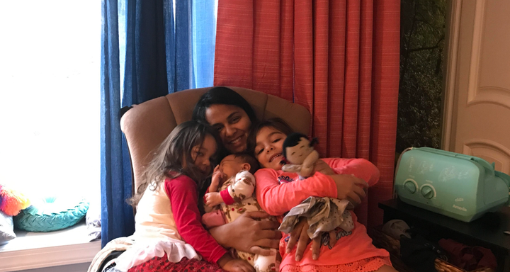 The author and her three children at home. "My beautiful kids love to hop on me mid-pump," she writes.