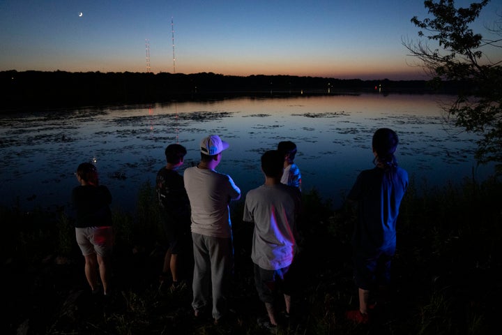 Friends and family gathered at Vadnais Lake on Friday after news broke of a child's body being found in the water.