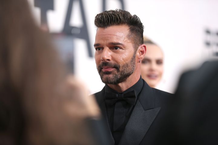 Officials attempted to serve a restraining order to singer Ricky Martin in Puerto Rico, but could not find him. Martin's representatives denied the allegations.